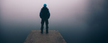 Guy just hanging out by the lake, thinking about stuff