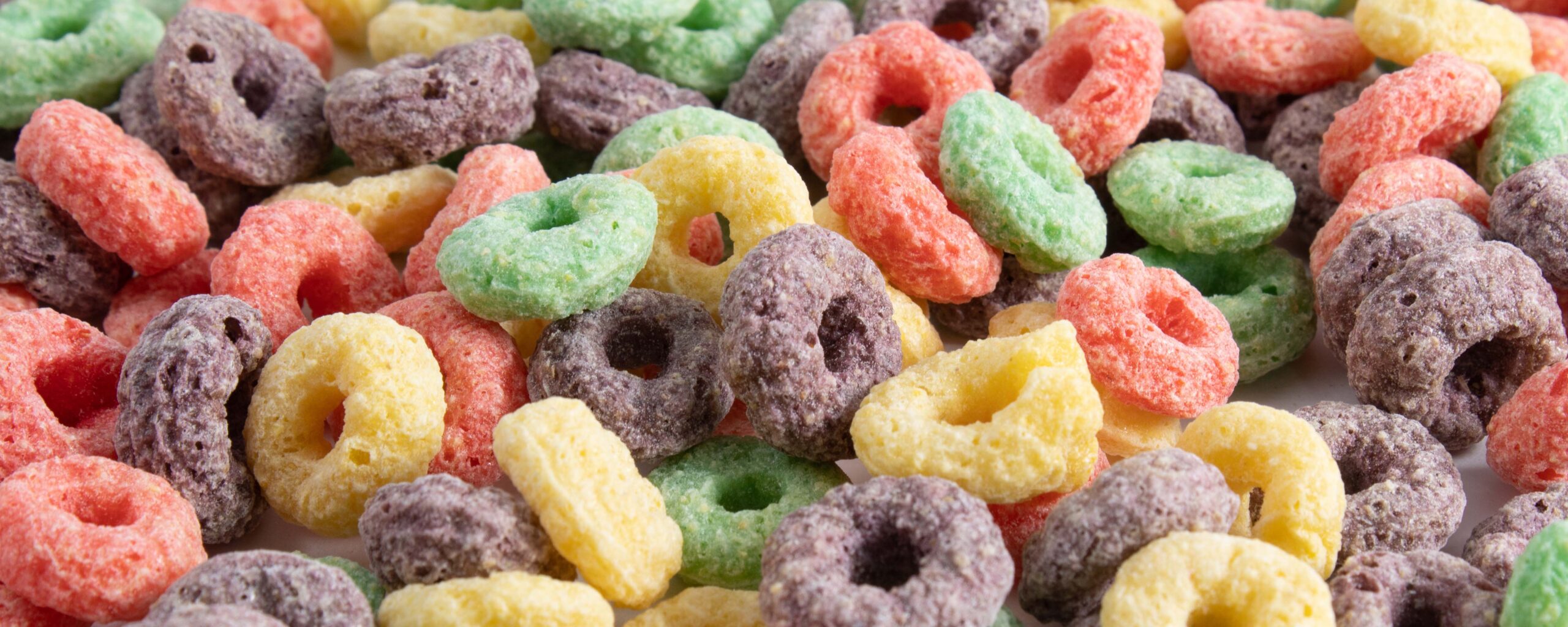 Image of colorful breakfast cereal loops to accompany a story on survey findings about MAHA and food related concerns.
