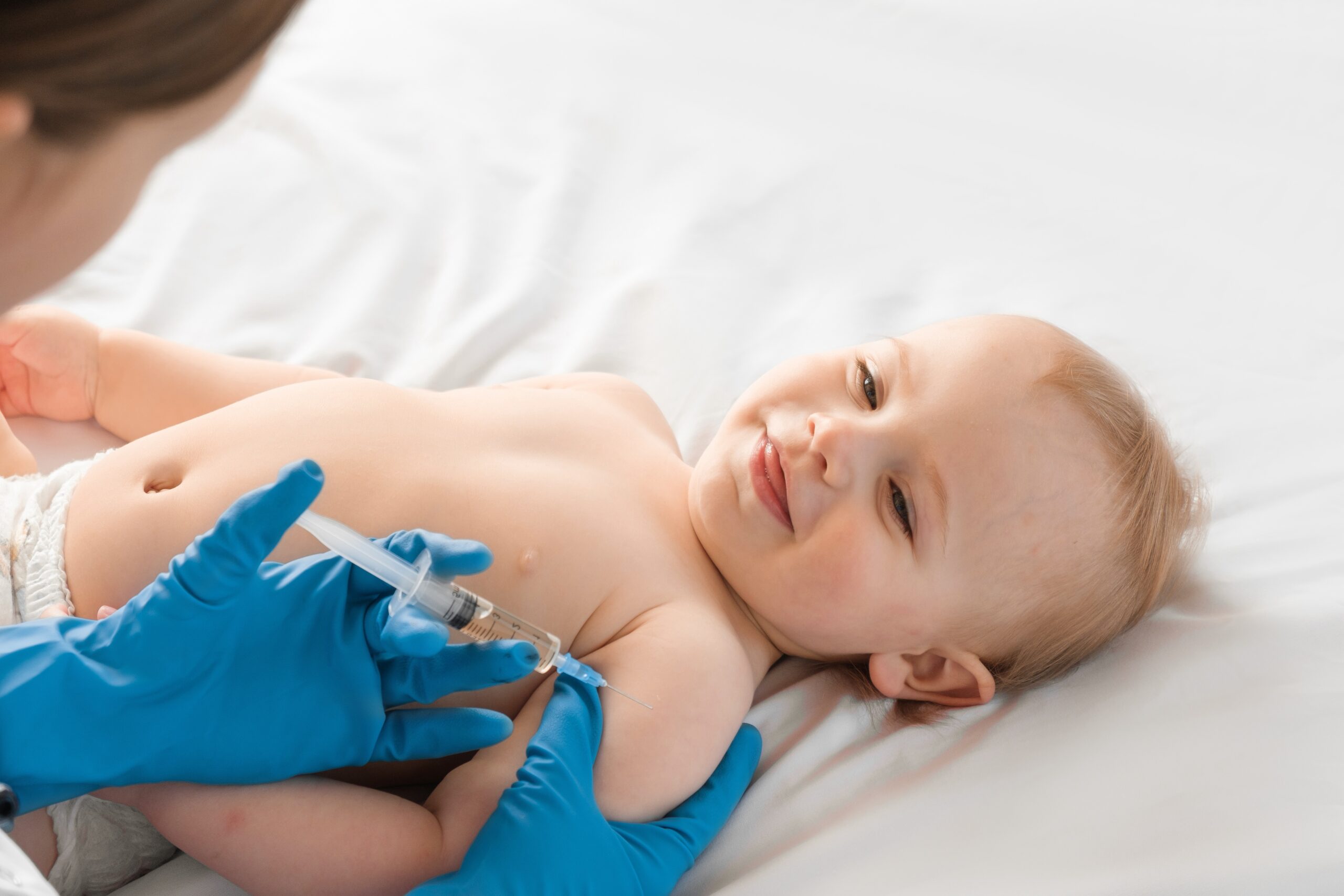 Baby getting vaccinated for release about hepatitis b