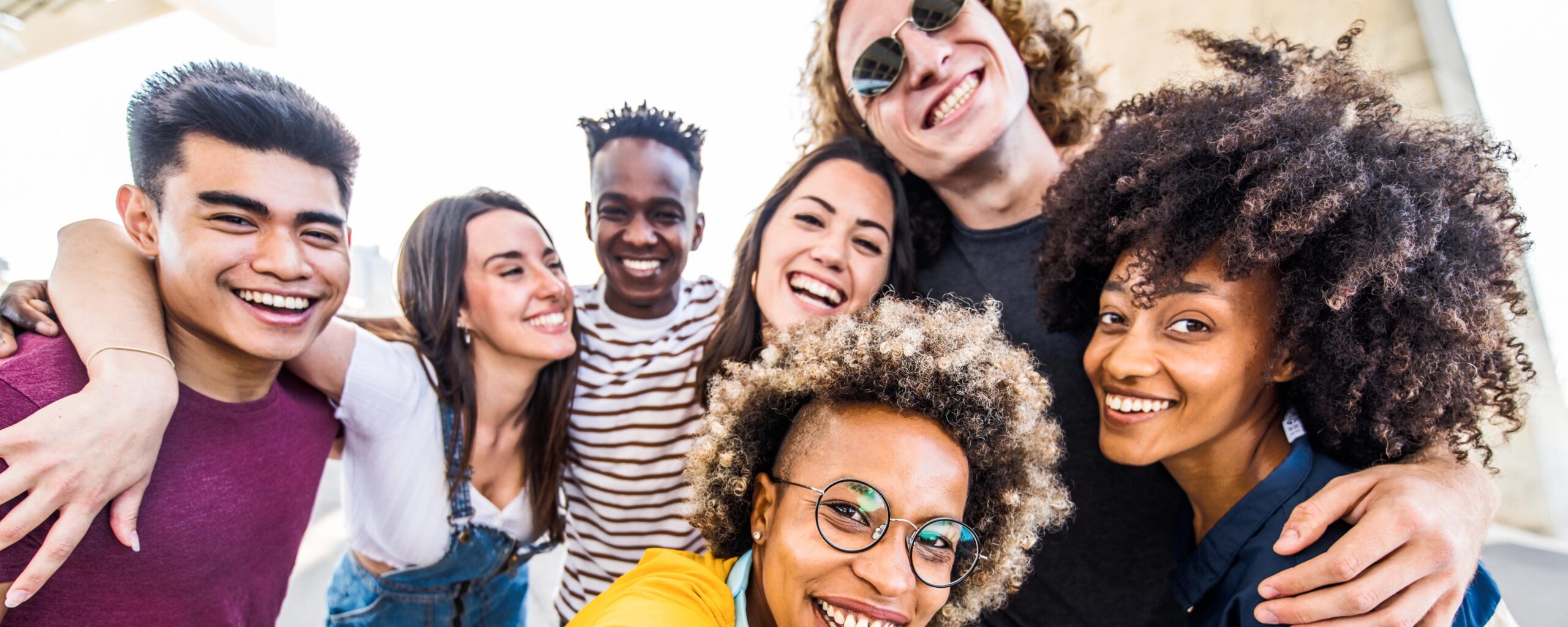 Picture of happy teenagers for release about adolescent mental healt.